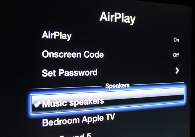 With the latest update for Apple TV you can stream video to your TV and sound to your AirPlay-enabled speakers